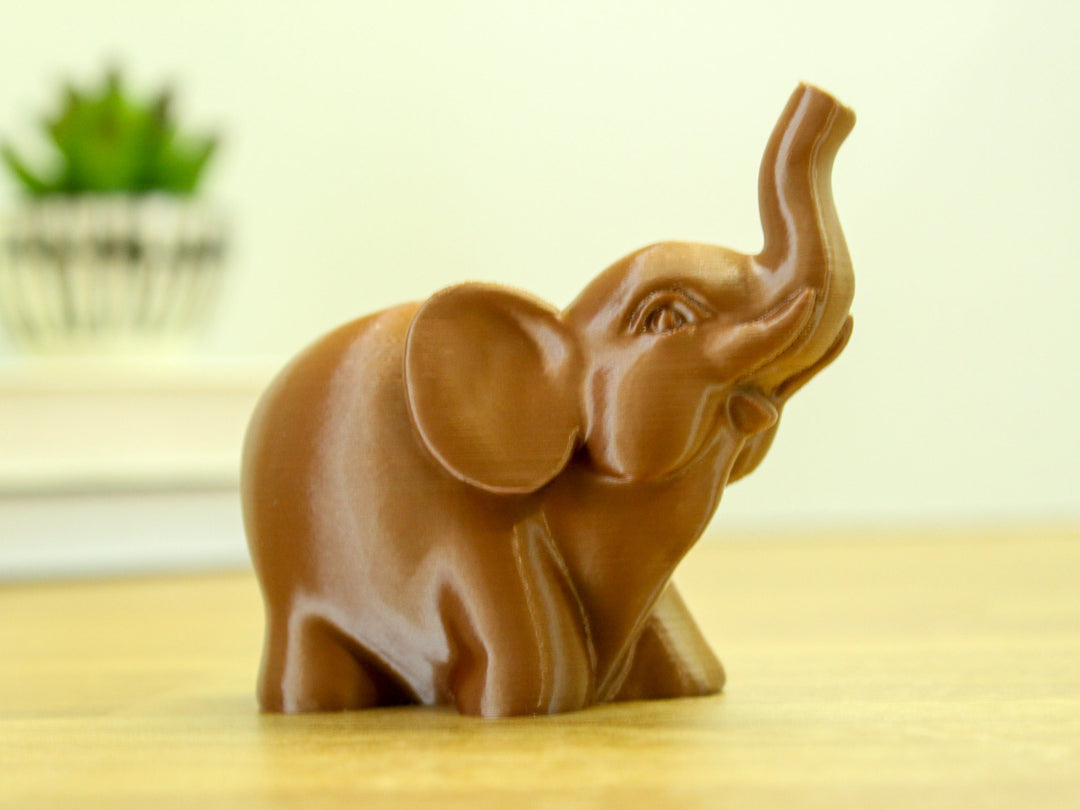 
  
  Adorable Elephant Figurine
  
