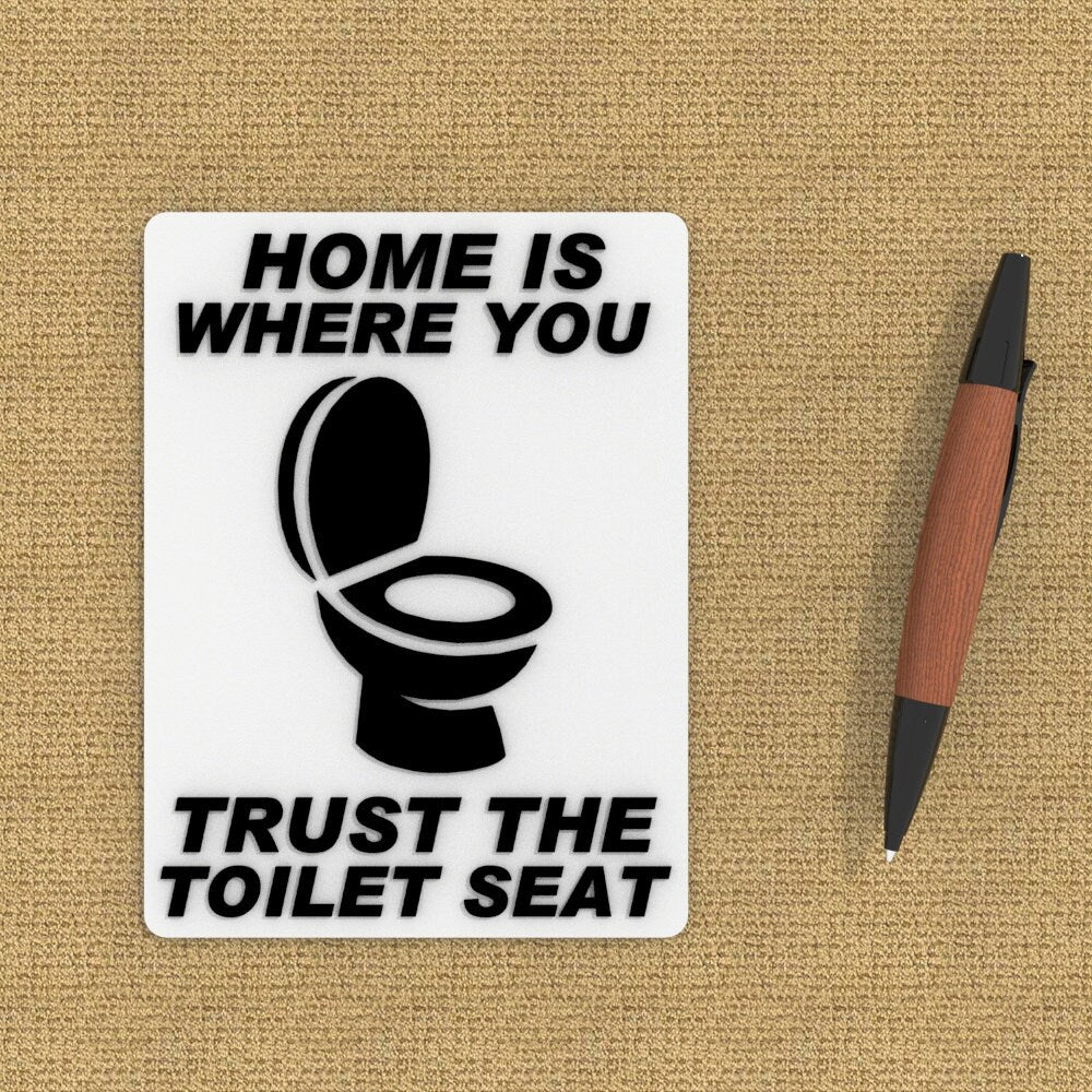 
  
  Funny Sign | Home Is Where You Trust The Toilet Seat
  
