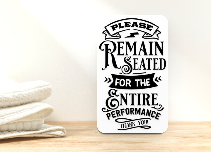 Please Remain Seated Bathroom Sign – Funny Humor Wall Decor for Home and Office