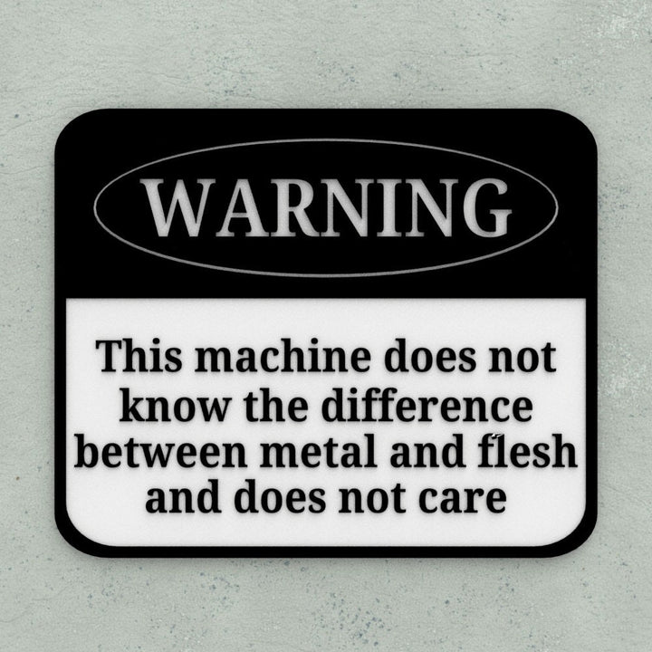 Funny Sign | This Machine Does Not Know The Difference Between Metal and Flesh
