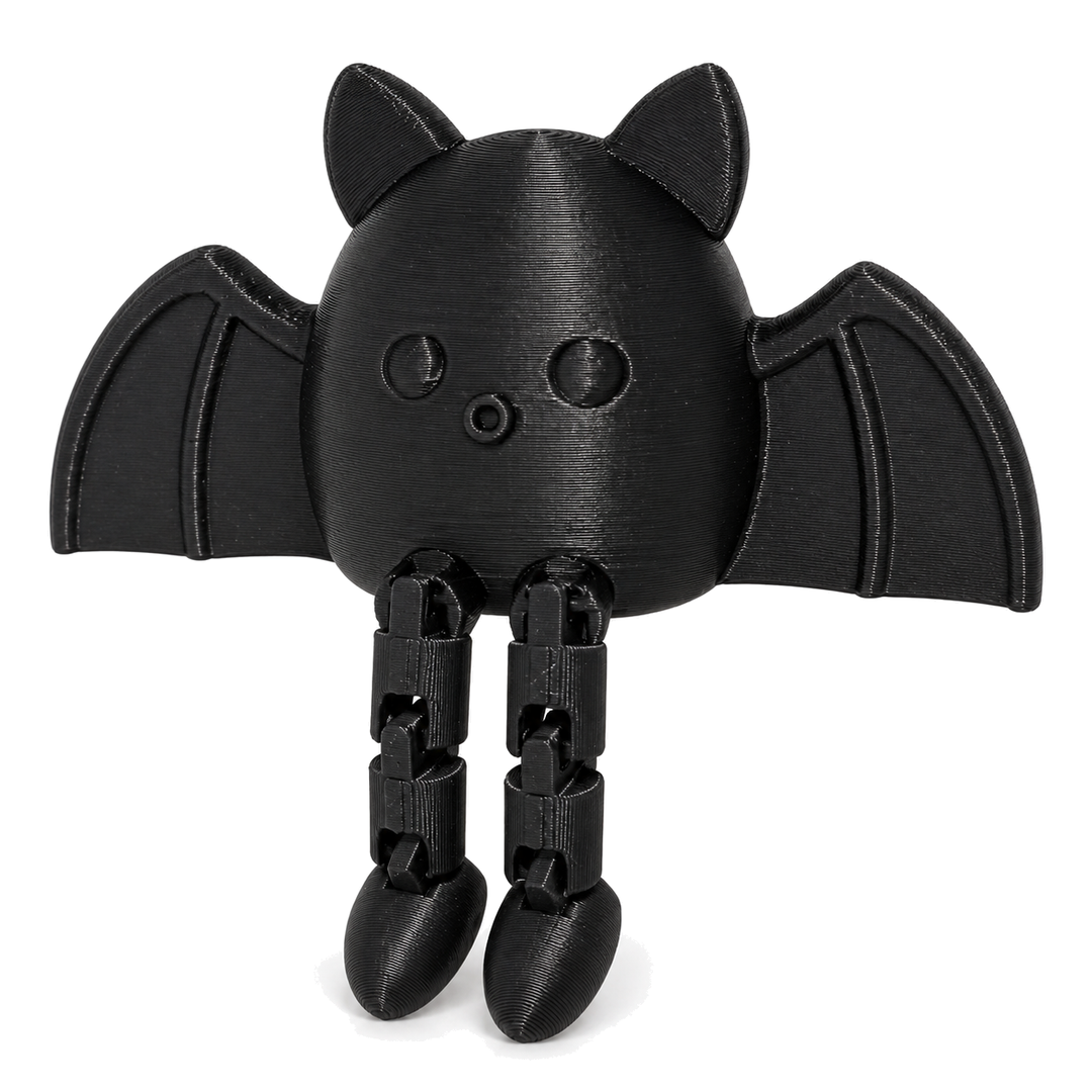Black articulated bat shelf sitter with dangling legs on a white background