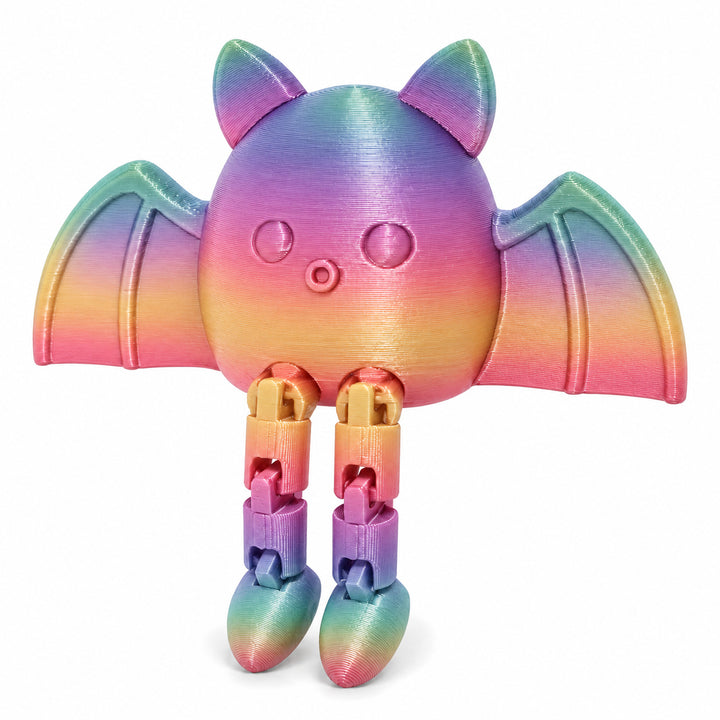 Rainbow color illustration of the articulated bat shelf sitter; digital color mockup