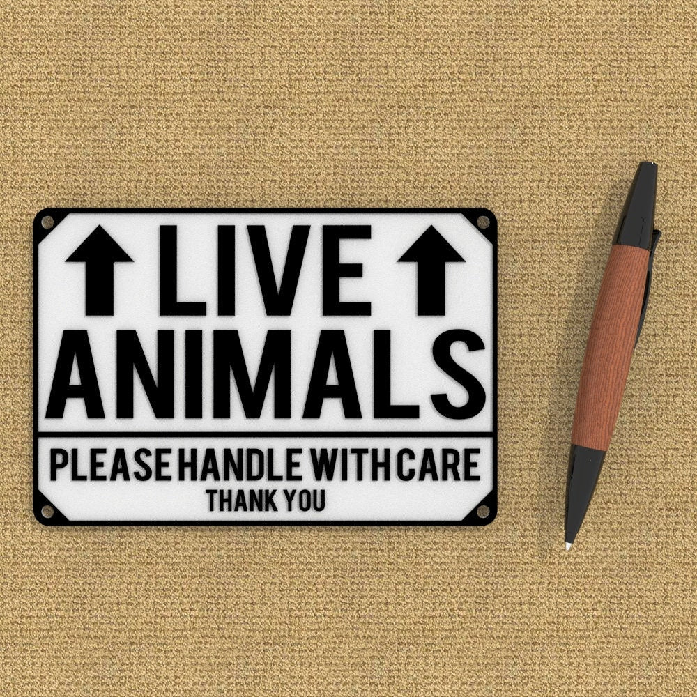 
  
  Sign | Live Animals Please Handle With Care
  
