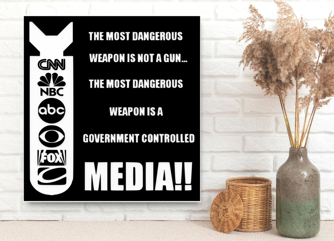 The Most Dangerous Weapon Is Not A Gun The Most Dangerous Weapon Is A Government Controlled Media | Funny Sign for Home or Office