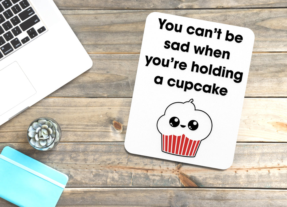 
  
  You Can't Be Sad when You're Holding A Cupcake | Funny Sign for Home or Office
  
