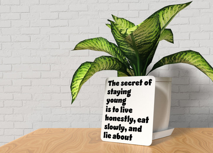 The Secret Of Staying Young Is To Live Honestly Eat Slowly And Lie About | Funny Sign for Home or Office