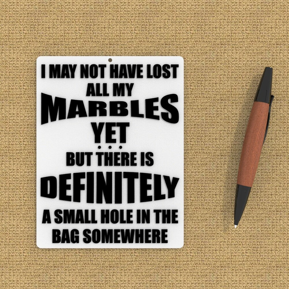 Funny Sign | I May Not Have Lost All Of My Marbles Yet But There is A Small Hole