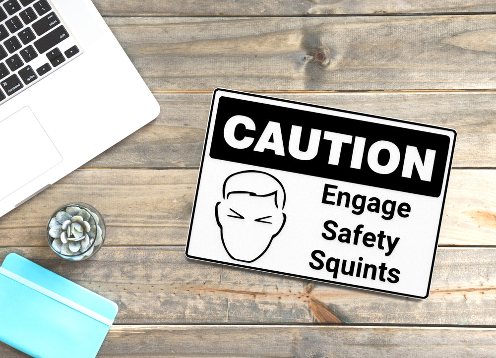 
  
  Caution Engage Safety Squints | Funny sign For Home or Office
  
