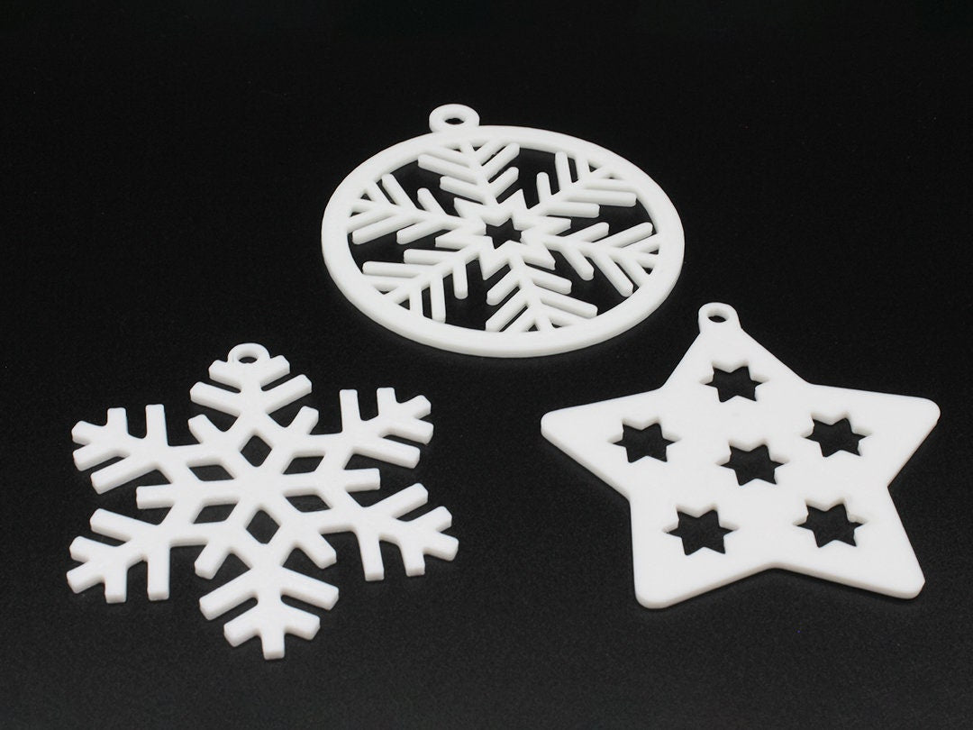 
  
  Set of 4 Unique Christmas Tree Snowflake Ornaments
  
